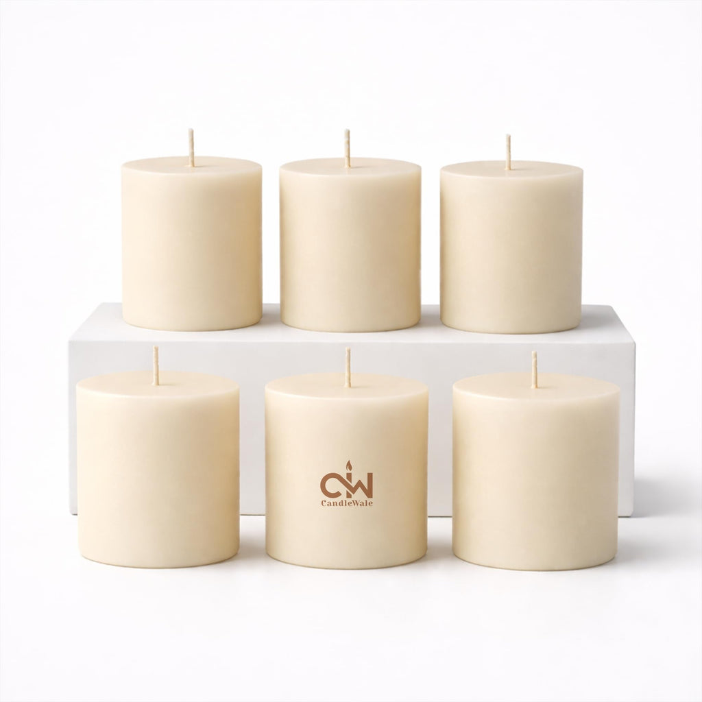 Set of 6 off-white pillar candles with cotton wicks, smooth cylindrical wax