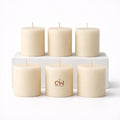Set of 6 off-white pillar candles with cotton wicks, smooth cylindrical wax