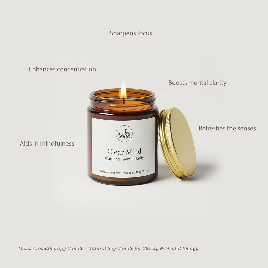 Clear Mind soy candle in amber glass jar with gold lid, lit wick
