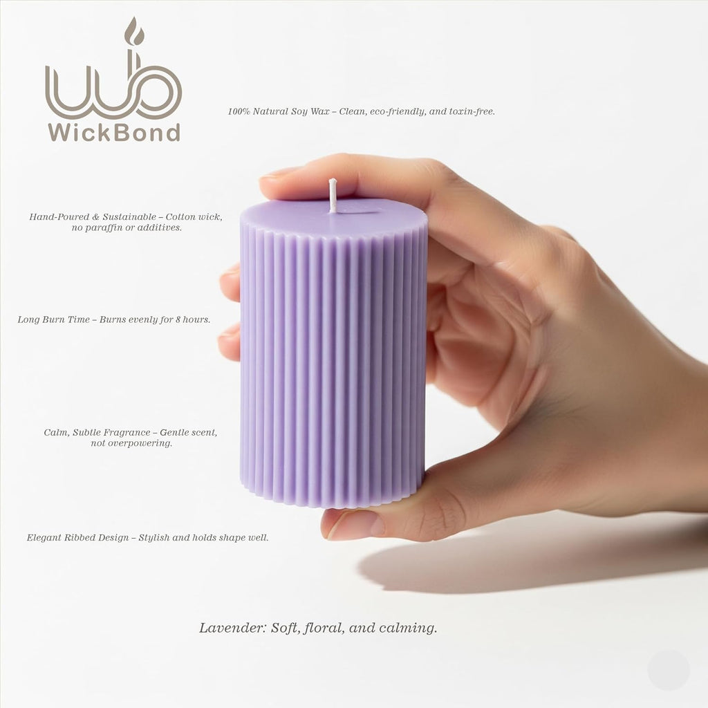 Lavender ribbed soy pillar candles set of 3 held in hand, unlit