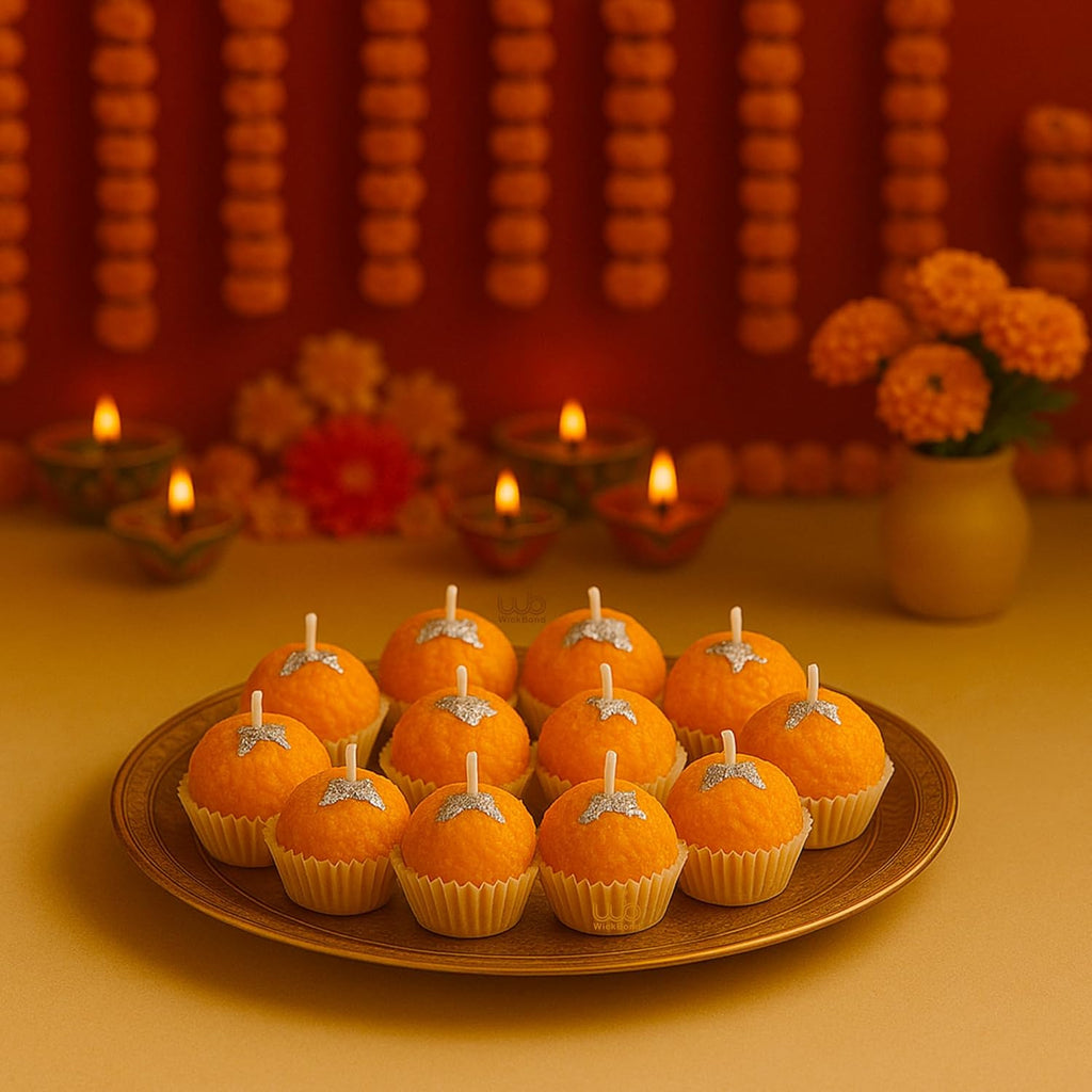 Motichoor ladoo soy wax candle, orange laddu shape with star-topped wick