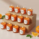Candlewale Votive Candle Set of 12 – Glass Filled Candles with Natural Wax & Lead-Free Wicks | 10-Hour Burn Time | Clean Burning, Non-Toxic | Ideal for Home Décor, Events & Gifting (Orange))