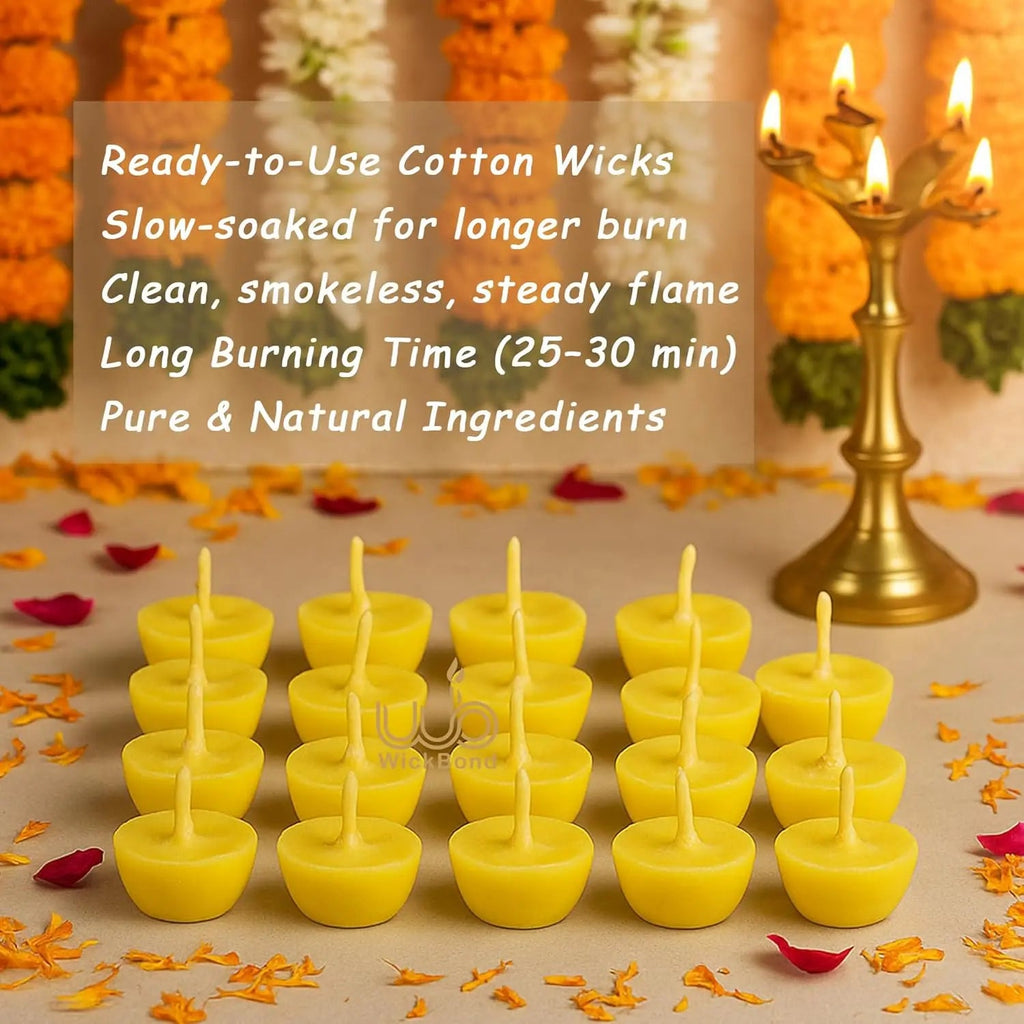 Row of yellow ghee diya battis with cotton wick, in a brass oil lamp scene