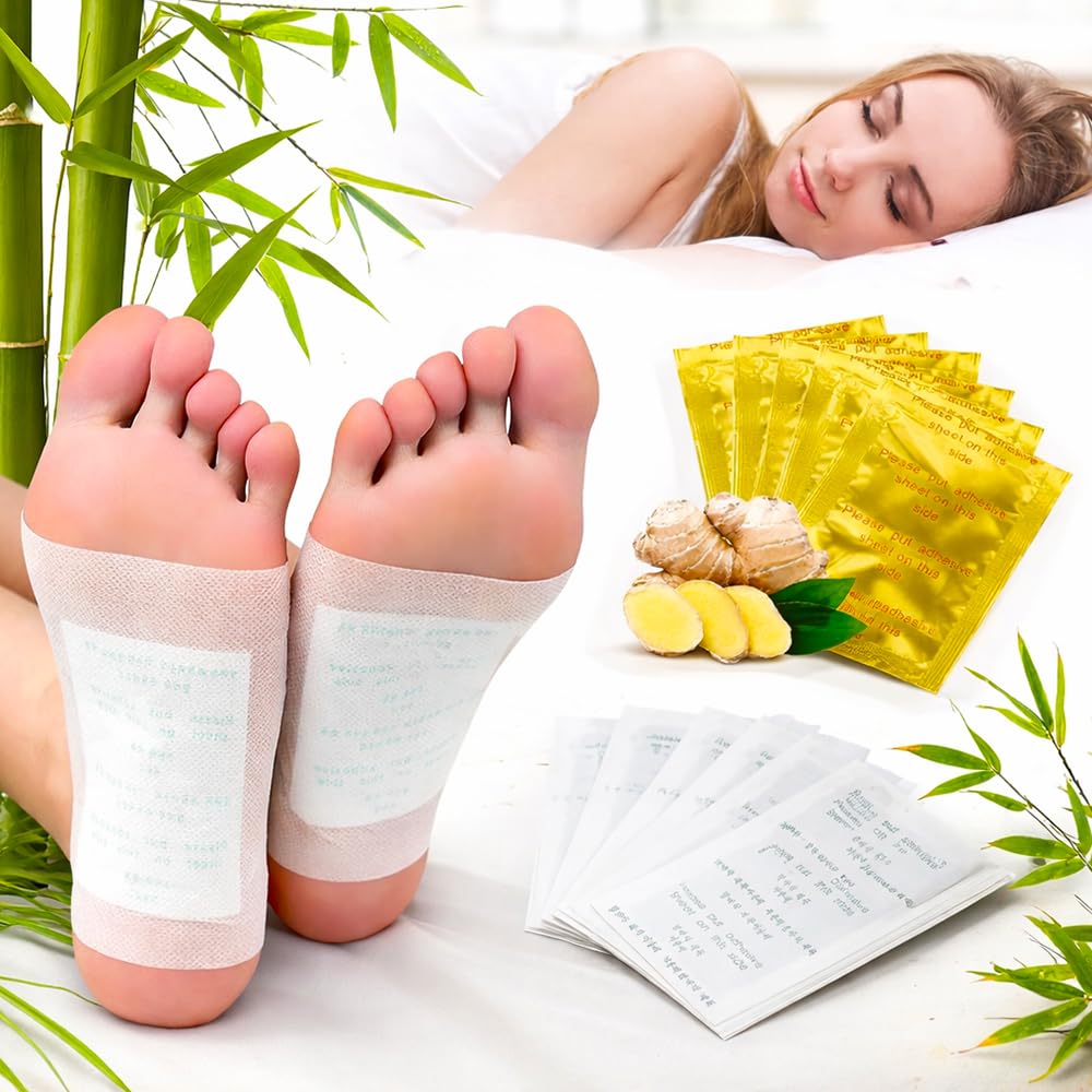 Detox foot patches on bare feet with ginger root and yellow sachets