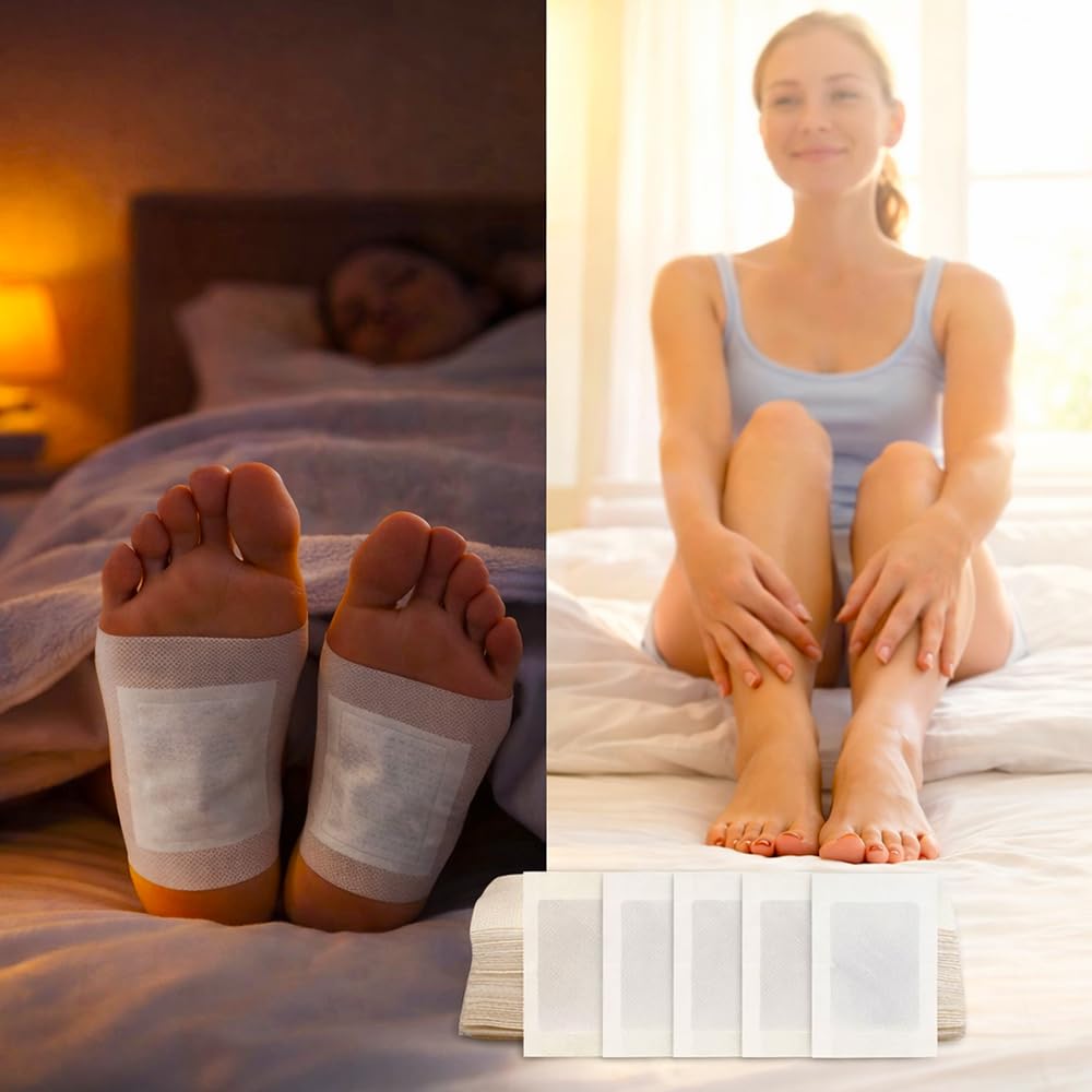 Detox foot patches on feet with stacked patch sheets in front of the bed